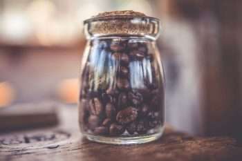Coffee beans in a sealed glass container